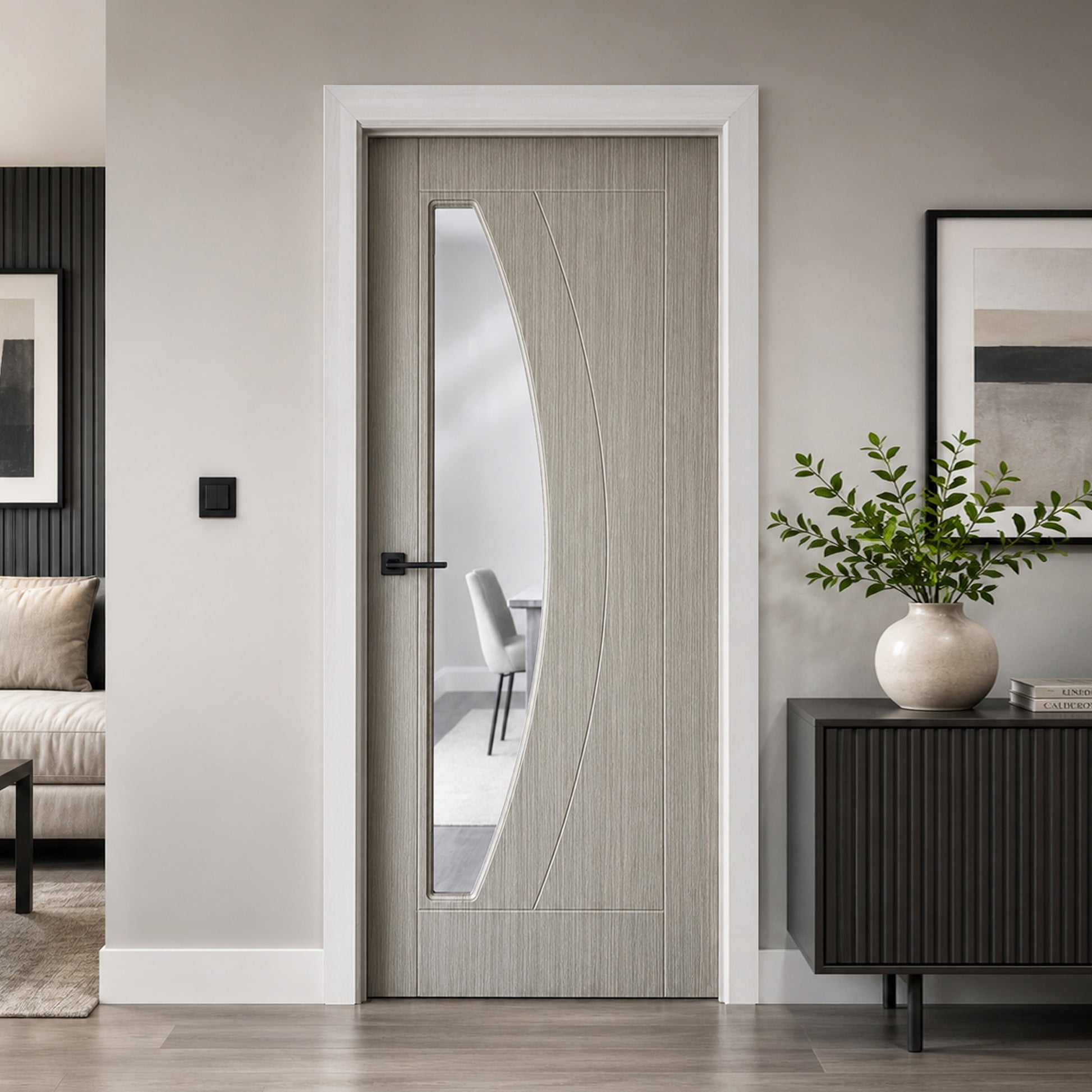 Modern Salerno Nova Grey 1 Lite 35mm  pre-glazed laminate door in a home setting with decor elements.