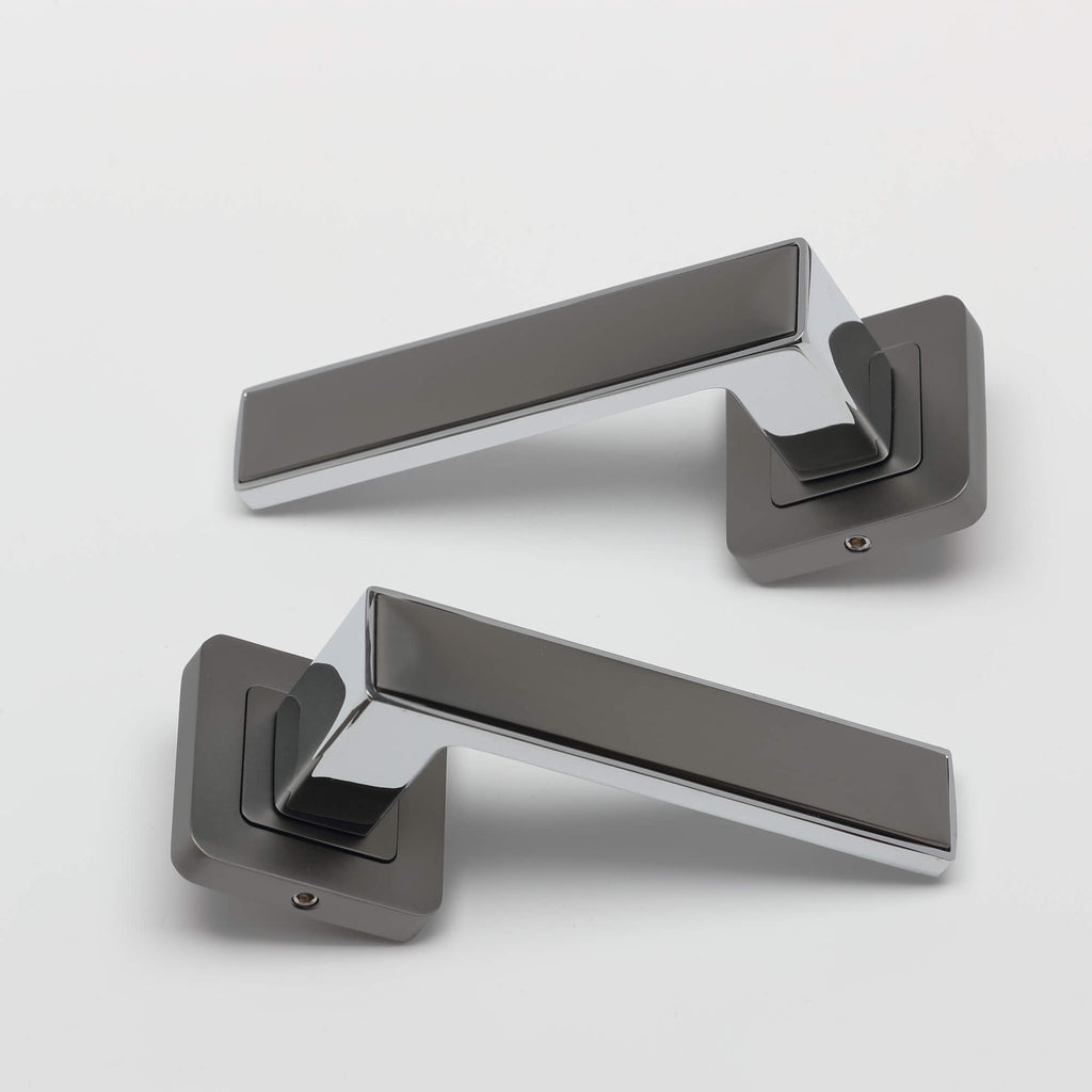A view of a pair of Alto Matt Satin Black & Polished Chrome Square Rose Handles on a white background.