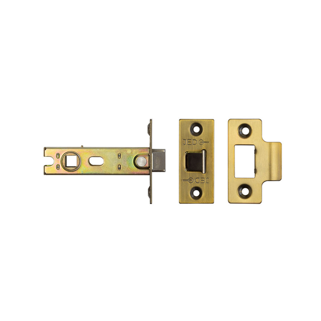 View of the components of a Antique Brass Tubular Latch on a white background.