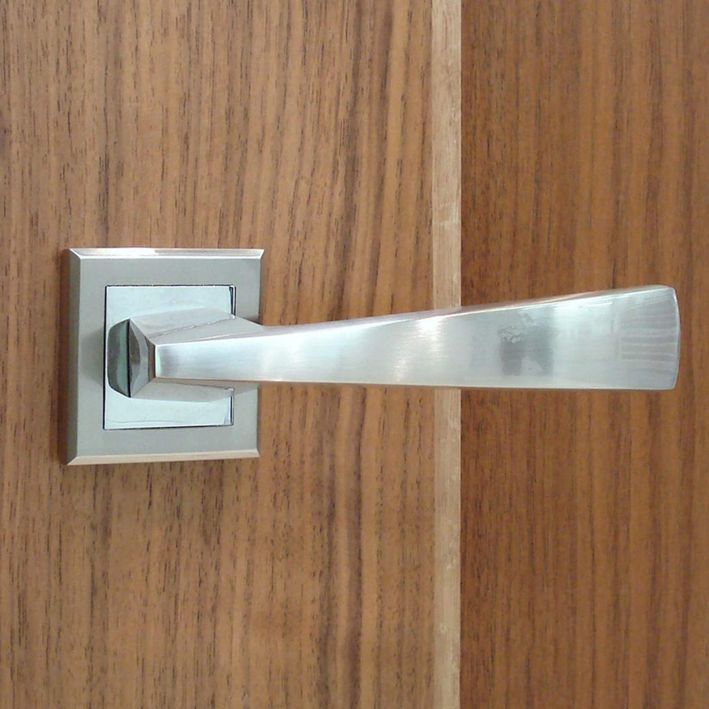 Close-up of an Arcus Nickel Brushed & Polished Chrome Square Rose Handle