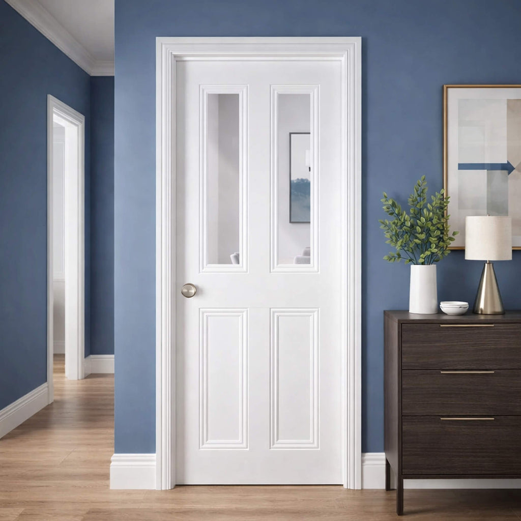 Ardmore White Primed 2 Lite 40mm Pre-Glazed Door in a hallway interior setting with blue walls and a wooden floor.