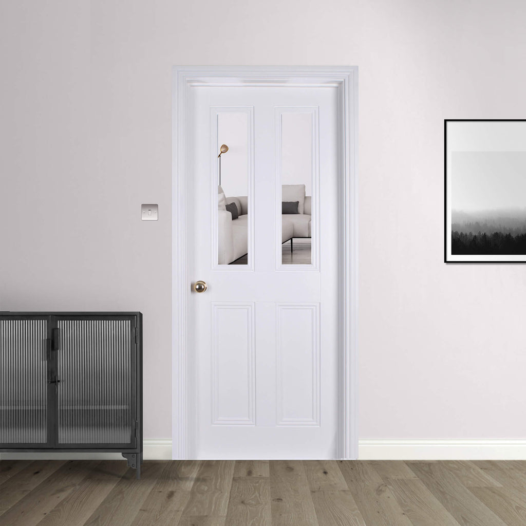 An Ardmore White Primed 2 Lite Pre-Glazed 40mm Internal Door in a room with a black cabinet and framed picture.