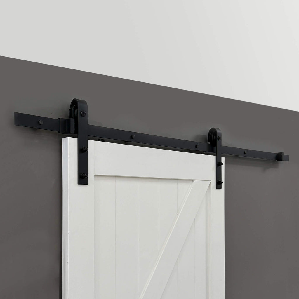 Black Barn Door Track in an interior home setting.