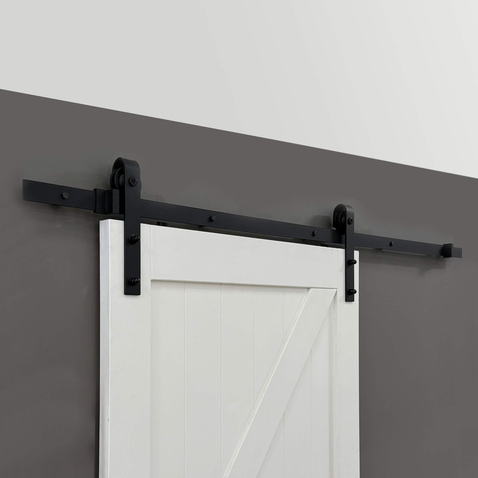 Black Barn Door Track in an interior home setting.