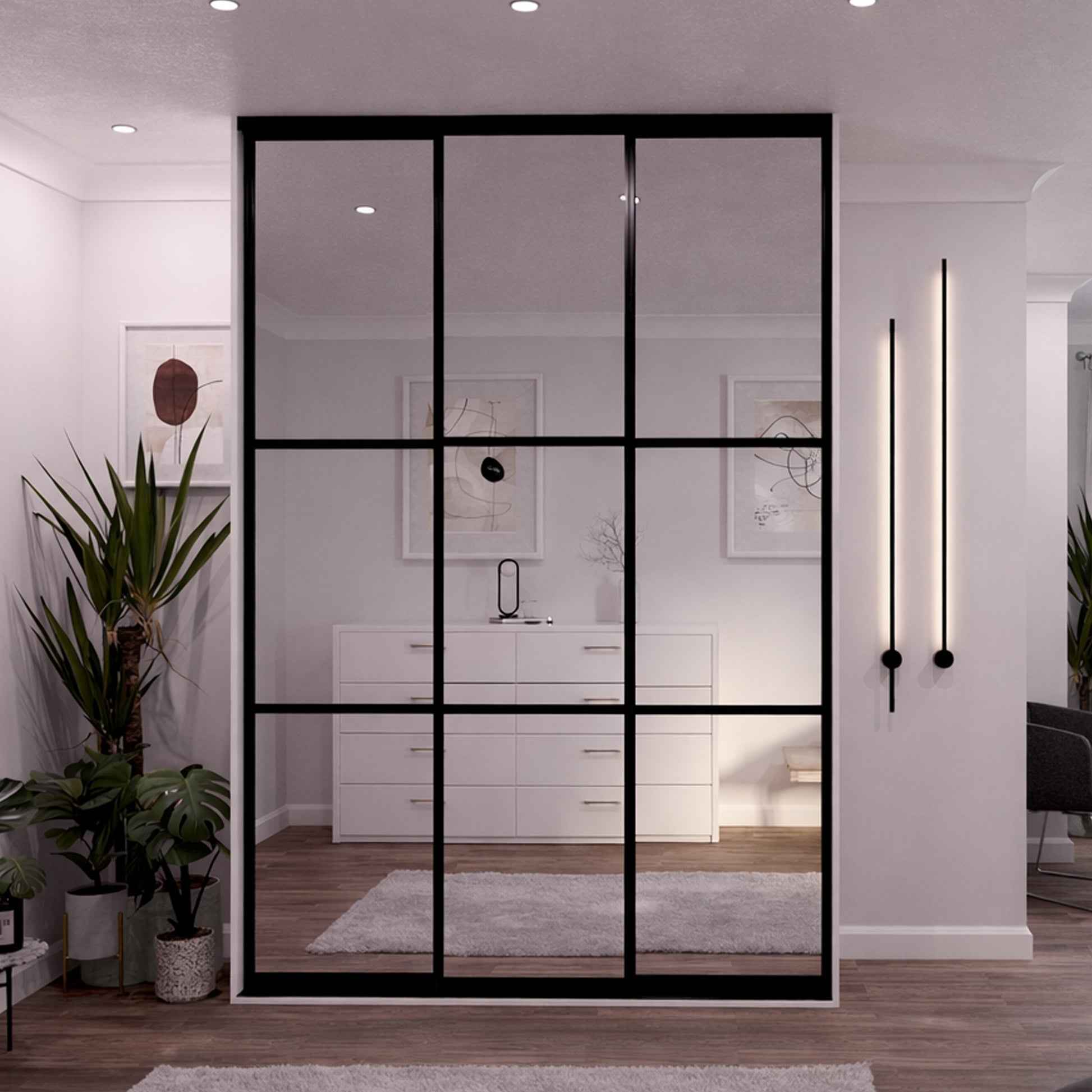 Modern hallway with Black Framed Mirrored Doors, plants, and decor.