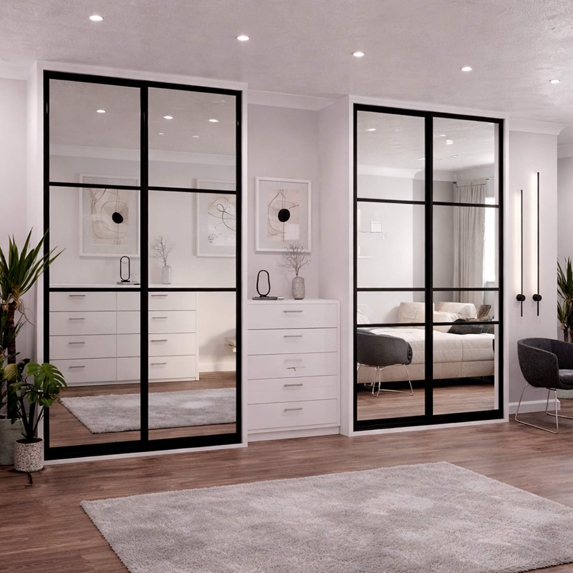 Modern bedroom with Black Mirrored Doors and white furniture.