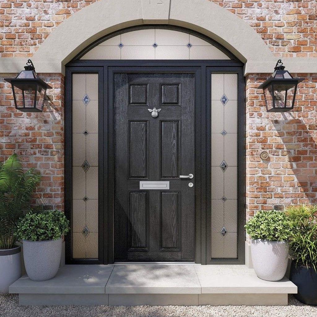 A Black 6 Panel Colonial Composite GRP Door with decorative glass panelled sidelights on a home front exterior