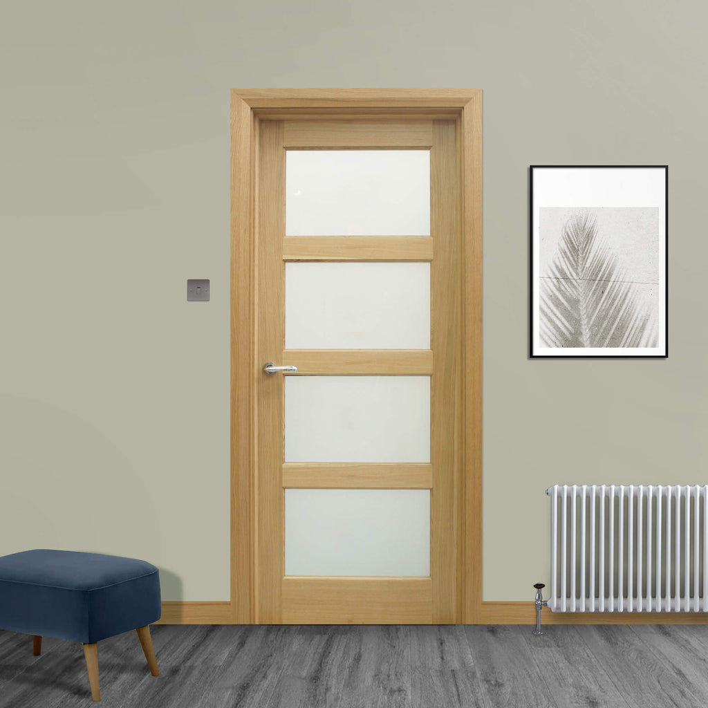 A Contemporary White Oak 4 Lite Unglazed Internal 40mm Door, with sandblasted 4mm toughened glass inserts for privacy, in a home interior setting.