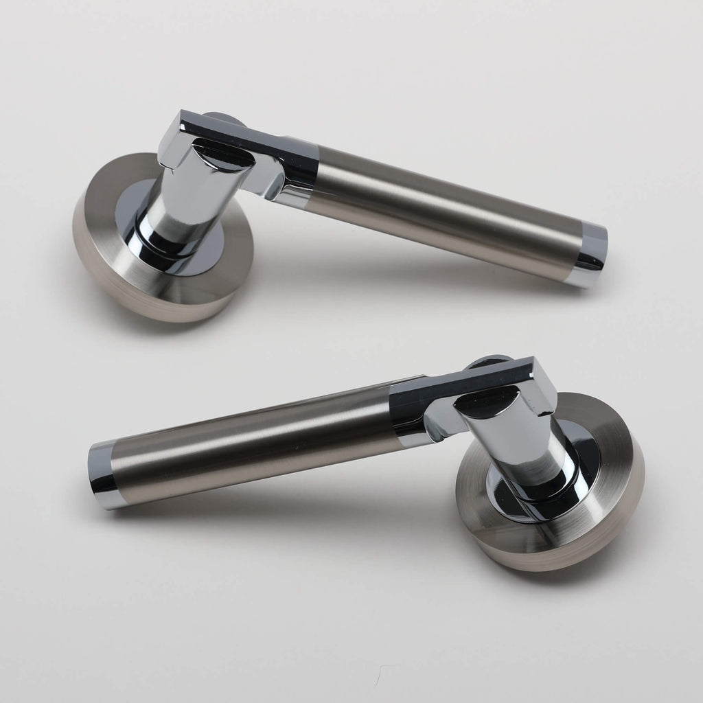 A pair of Cumulus Nickel Brushed & Polished Chrome Handles on a light grey background.
