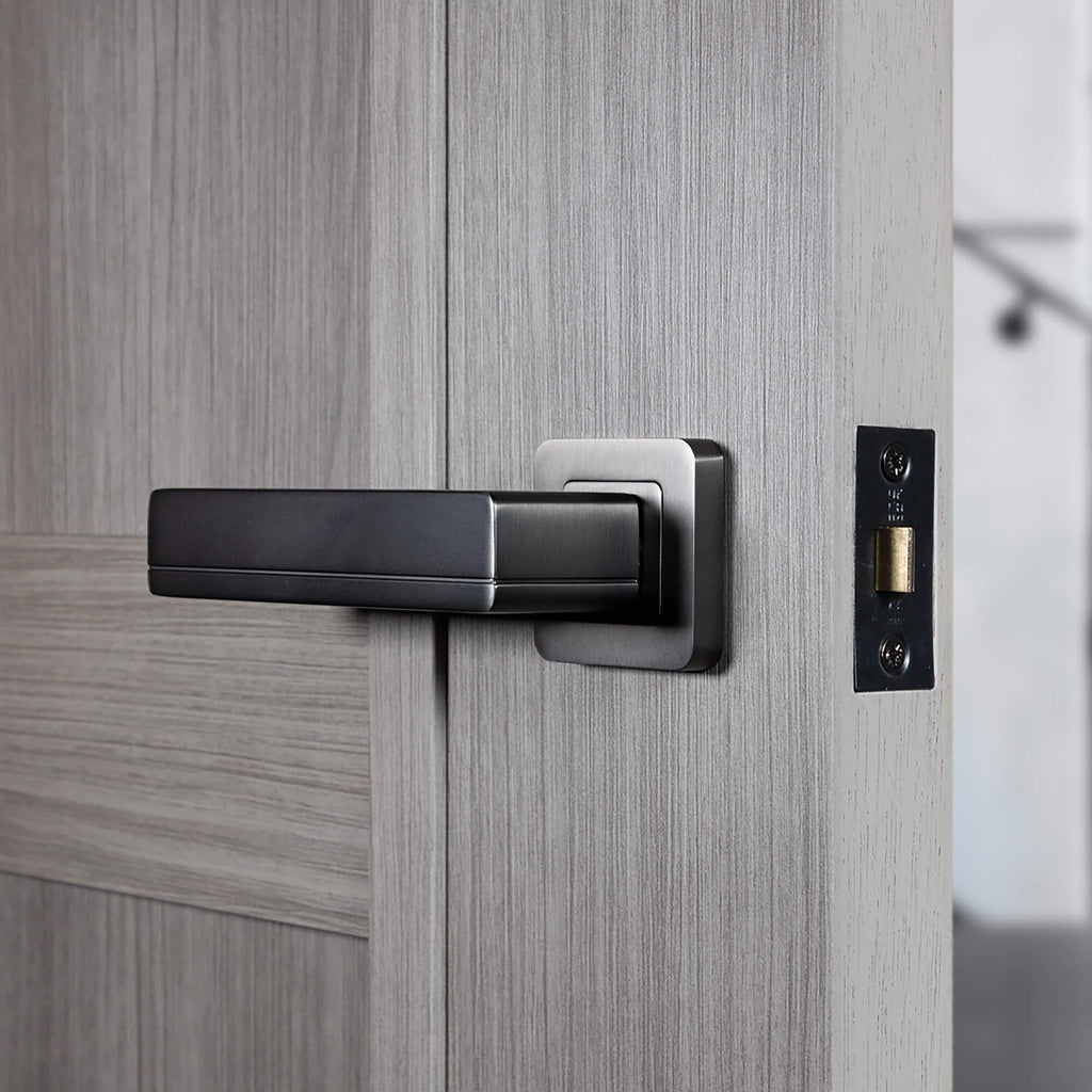 A Hermes Matt Satin Black Square Rose Handle on an internal laminate door 
