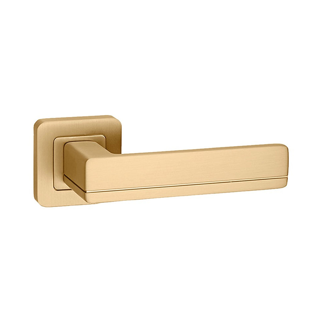 A Hermes Satin Brass Square Rose door handle on a white background