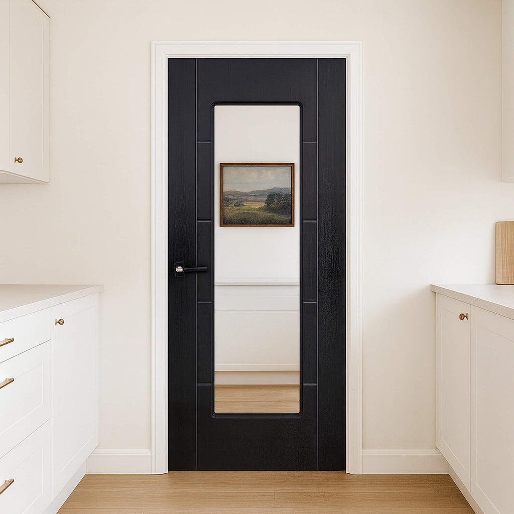 An Iseo Black Ash 1 Lite Pre-Glazed Laminate 35mm Internal Door in a Kitchen, looking into a utility room with white walls and wooden flooring.