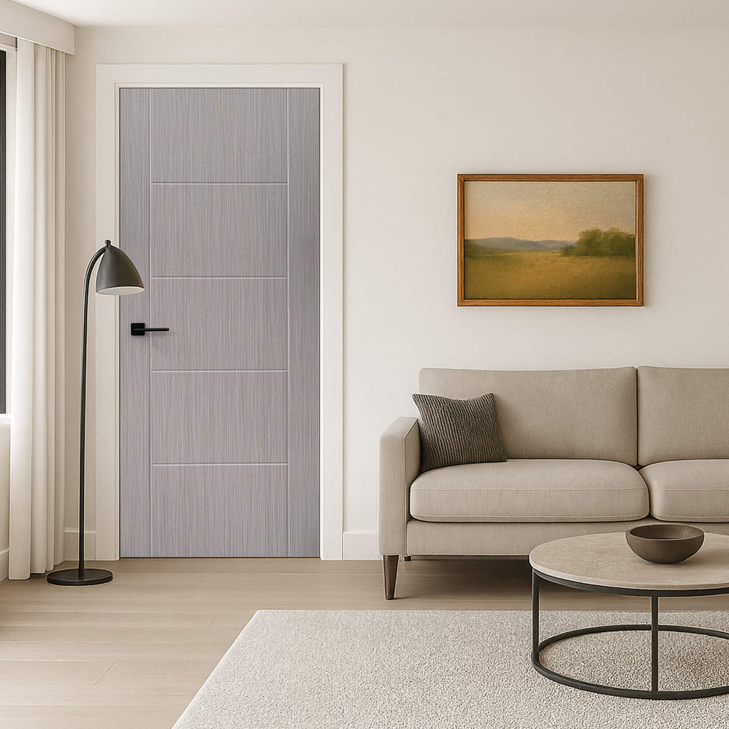 An Iseo Nova Grey 35mm Laminate Door, with a Flat Black Hera Handle, in a living room setting.