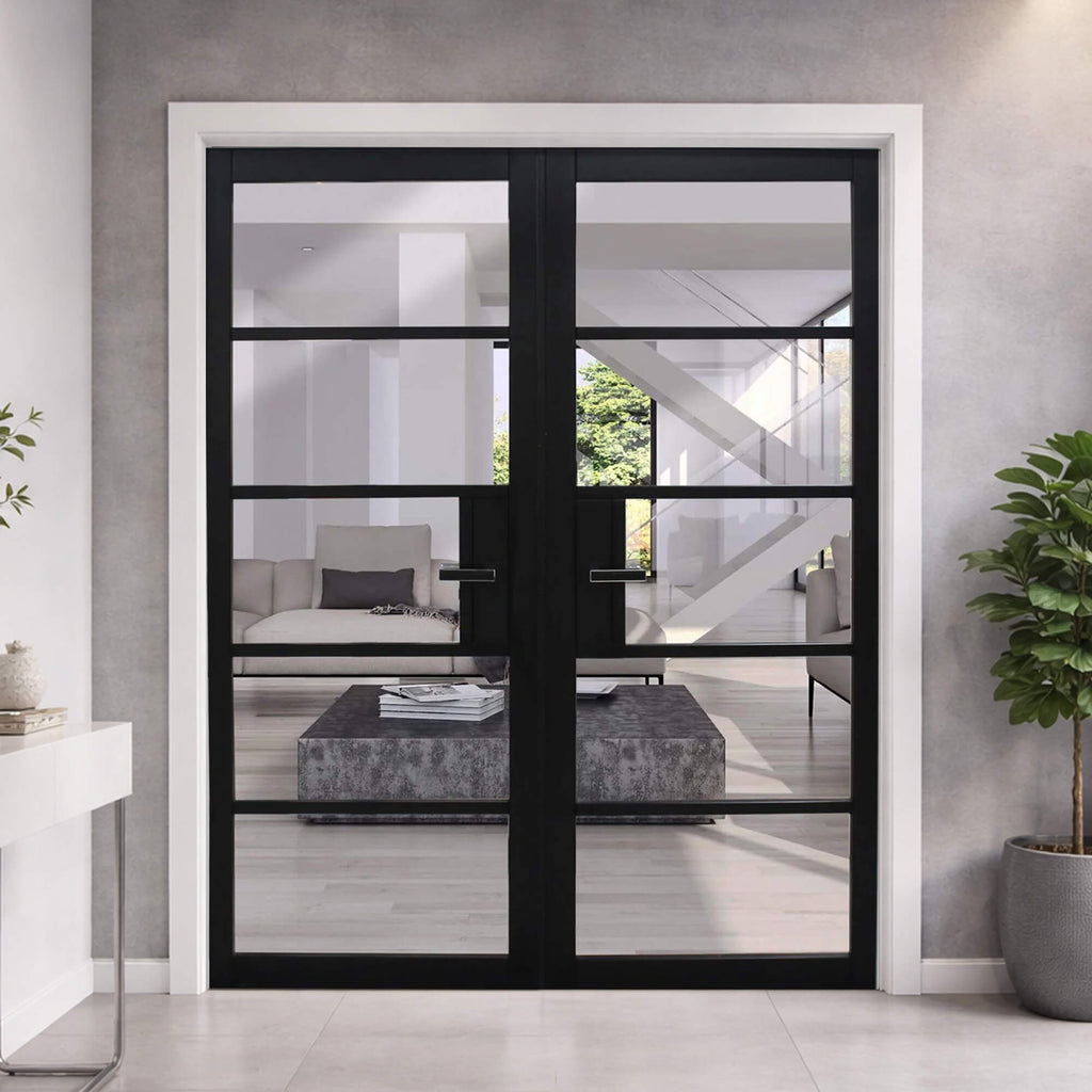 The Kew Black Primer Plus 5-Lite Pre-Glazed Double Door Set looking into a living room from a hallway.