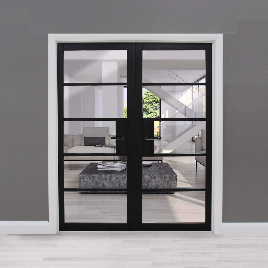The Kew Black Primer Plus 5-Lite Pre-Glazed Double Door Set looking into a living room, in a home setting.