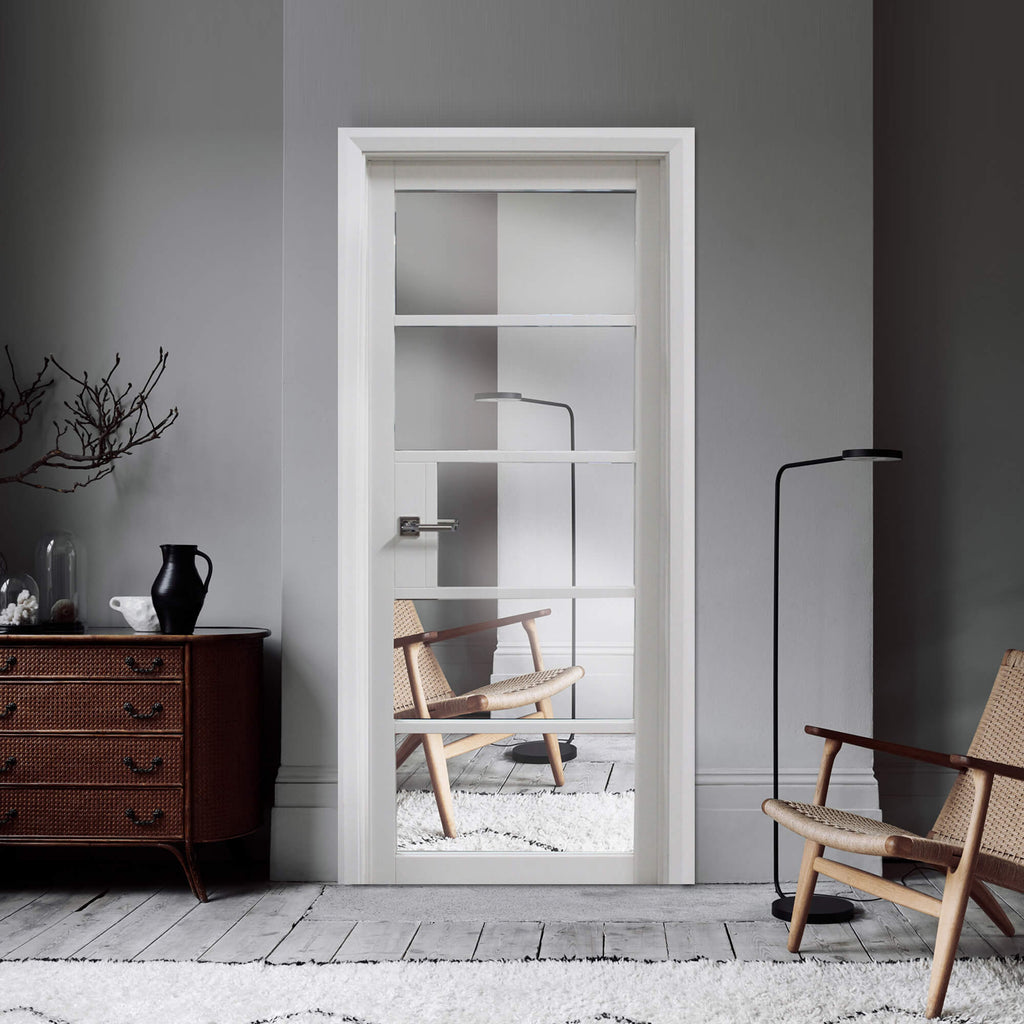 A Kew White Primer Plus 5 Lite Pre-Glazed Door in a minimalistic room.