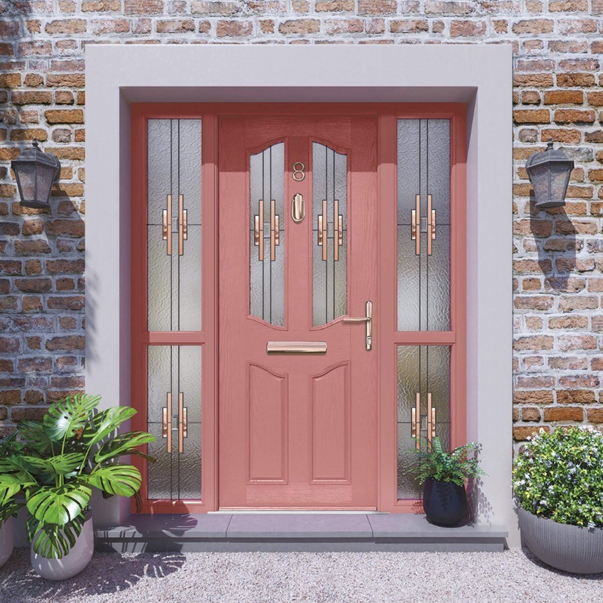 A Pink Lismore Composite GRP Front External Door with decorative glass panels on a brick wall background.