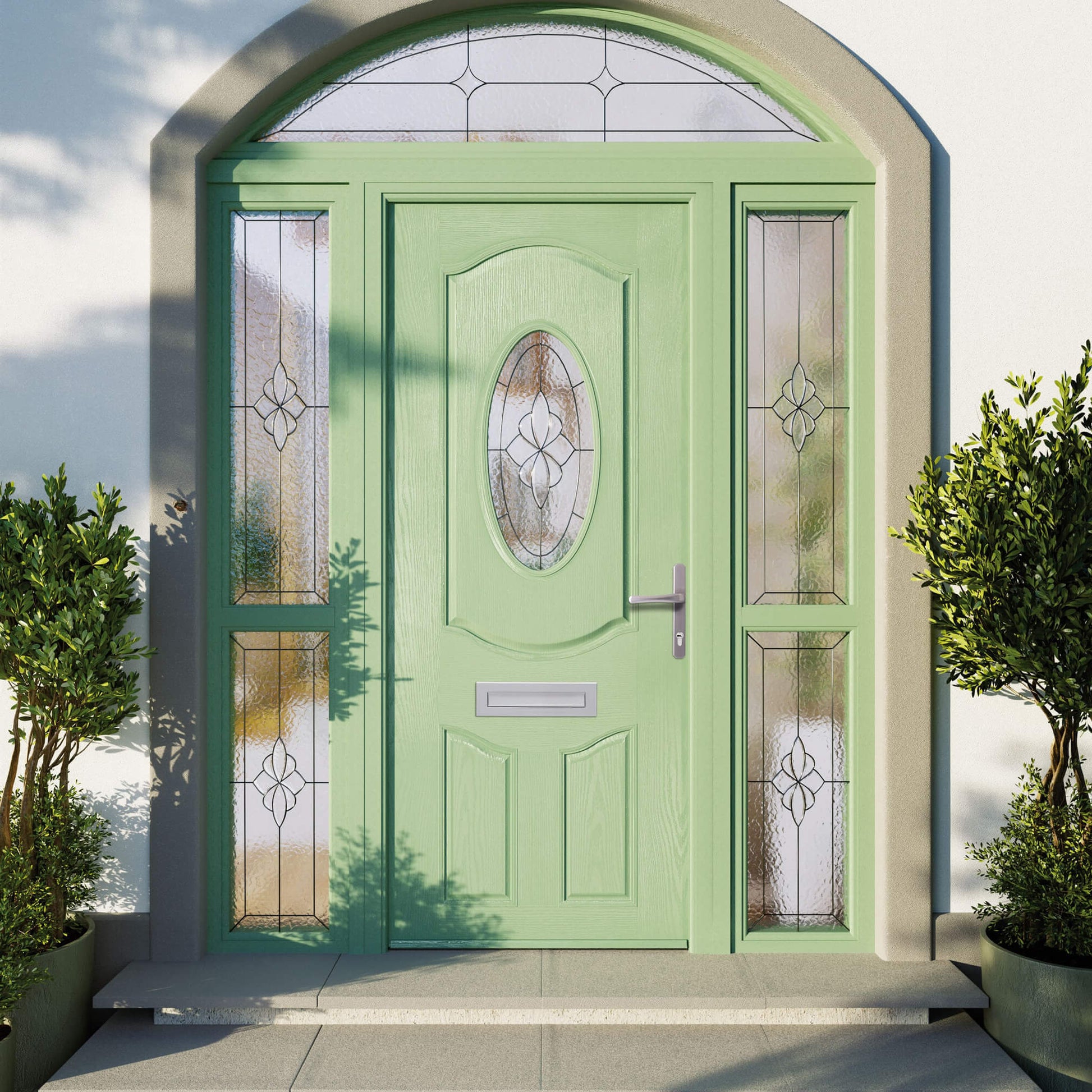A Chartwell Green Ludlow Composite GRP Door on a modern home exterior