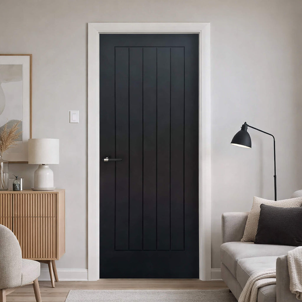 Mexicano Black Primer Plus 35mm Door in a modern living room setting.