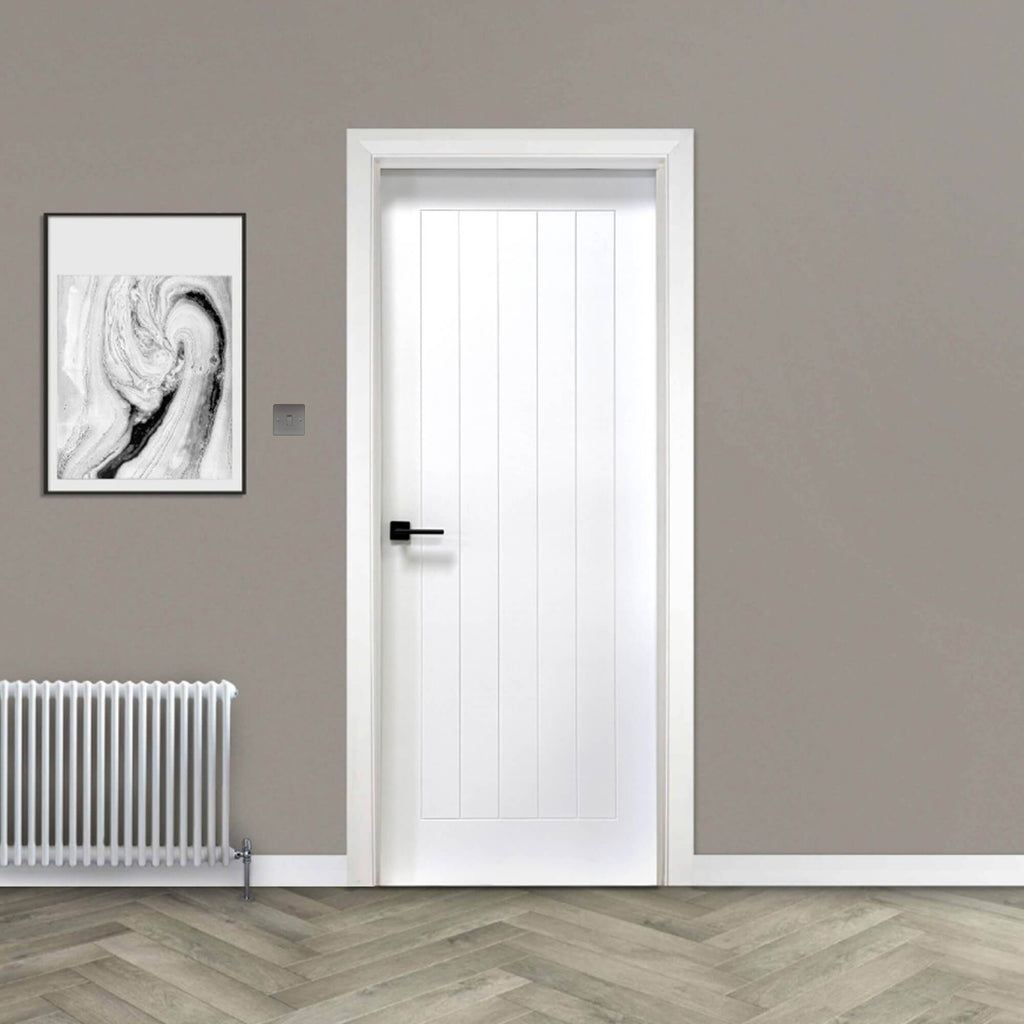 Mexicano White Primed Paint Grade Door in a home interior setting.