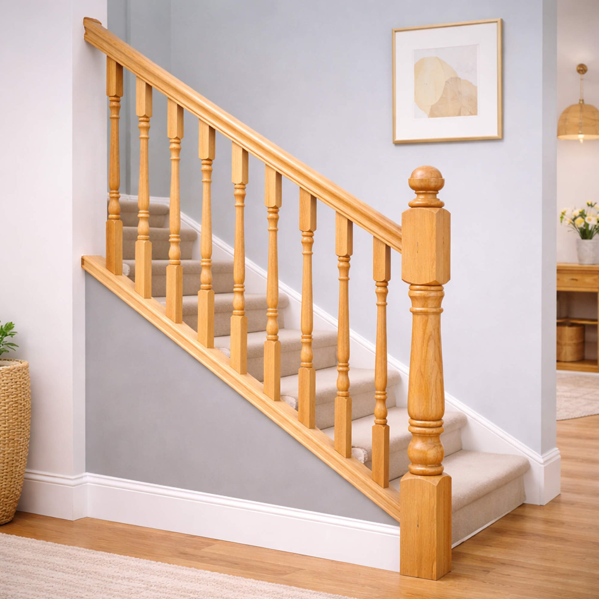 Wooden staircase with oak standard spindles in a home interior setting.