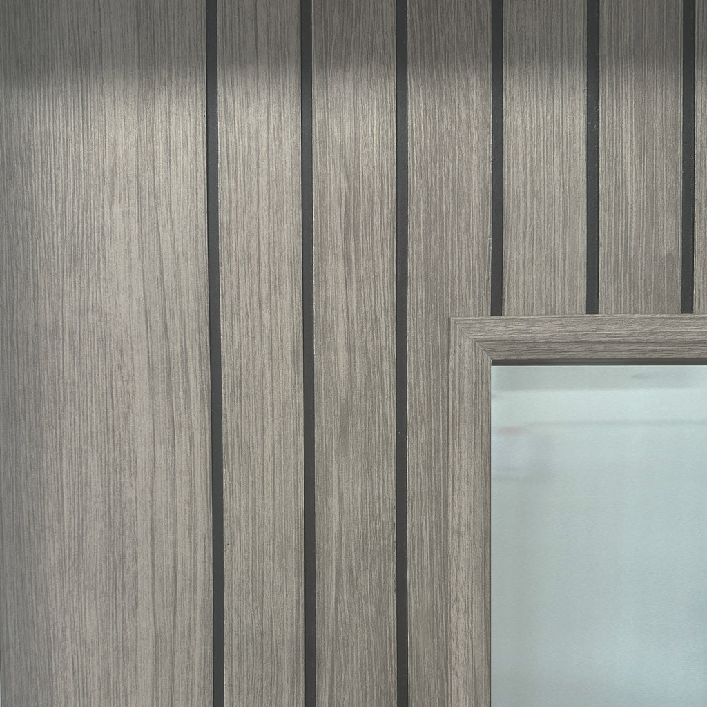 Close up of the slate all design, woodgrain and panelling on an Ottawa Lava Grey 1 Lite Pre-Glazed 35mm Internal Laminate Door.