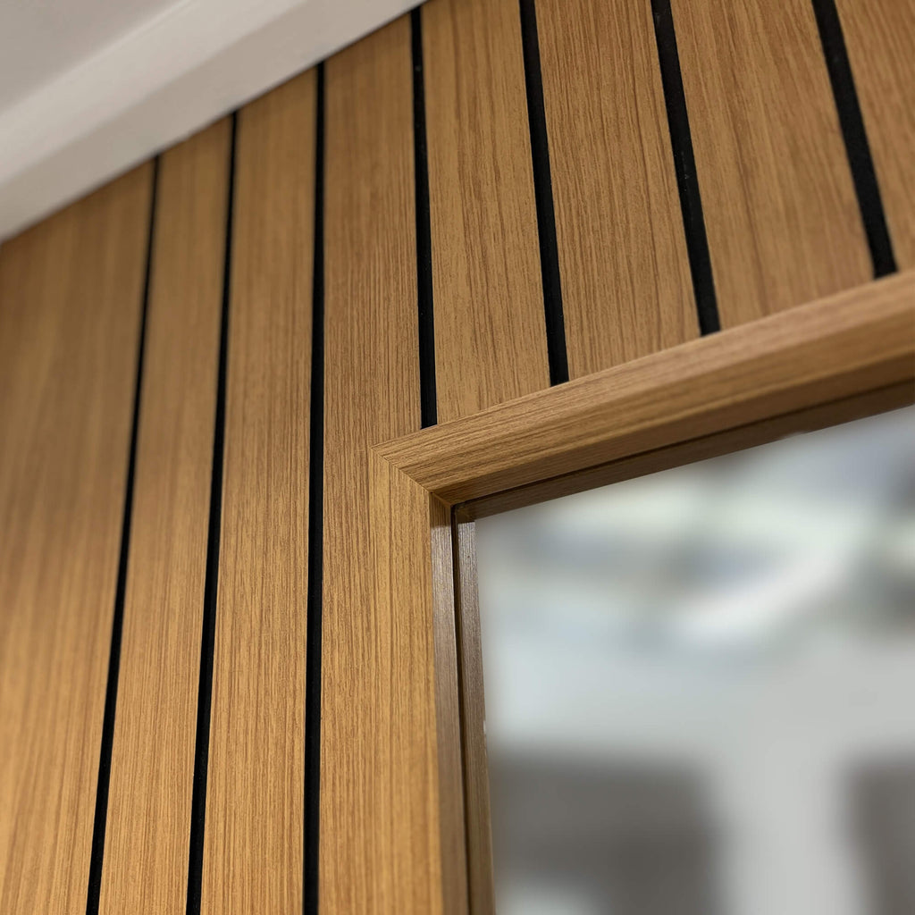 Close-up of wood grain and panelling on an Ottawa Olive Oak 1 Lite Pre-Glazed 35mm Laminate Door.