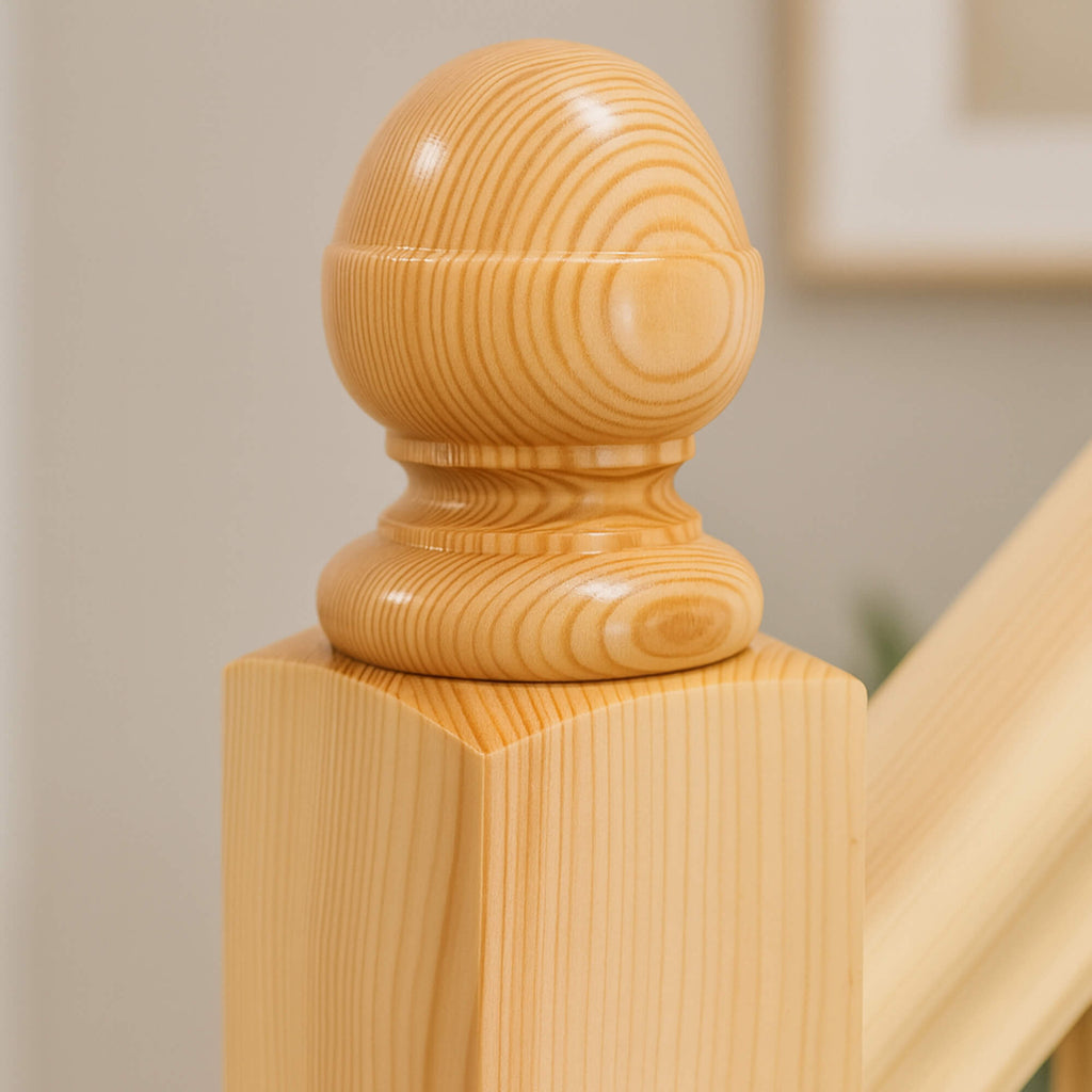 Redwood Pine Acorn Newel Cap in a home interior setting
