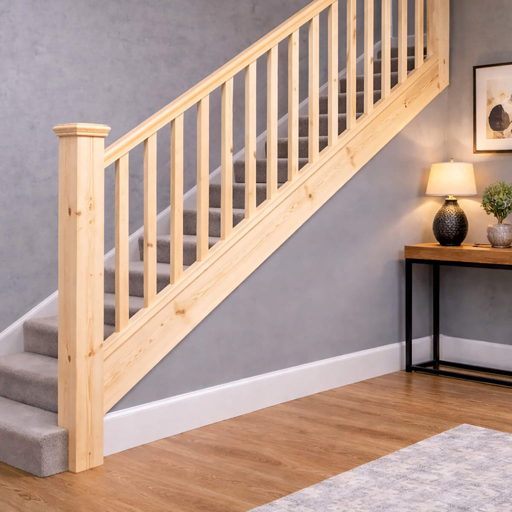 Redwood Blank Spindle and newel post  staircase with a light grey wall and wooden floor.