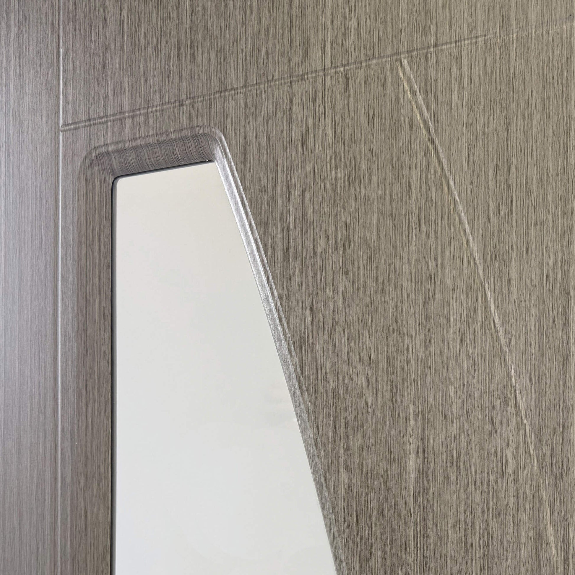 Close-up of a Salerno Nova Grey 1 Lite 35mm laminate pre-glazed door with a glass panel