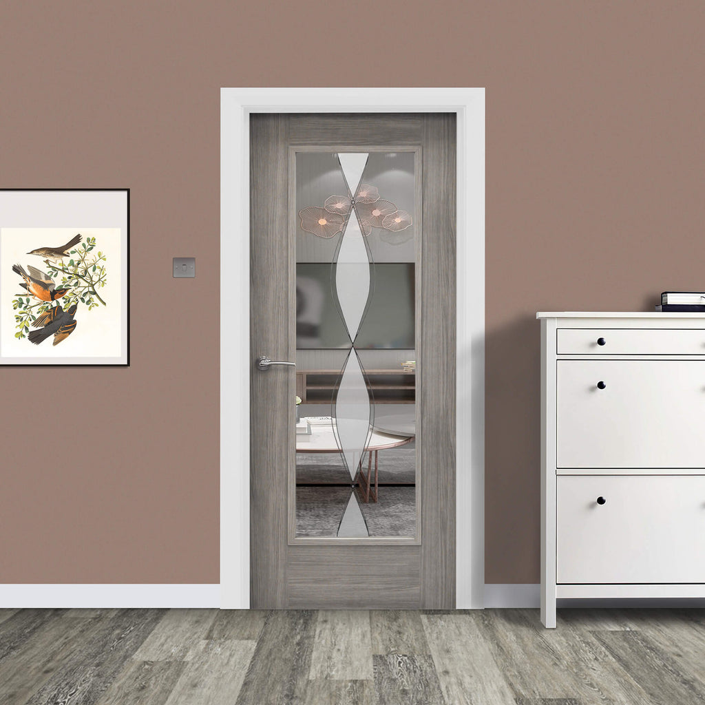 A Shaker Lava Grey 1 Lite Unglazed 40mm Internal Laminate Door, with 4mm DS6 decorative glass inserted and a Storm door handle, in a home interior setting.