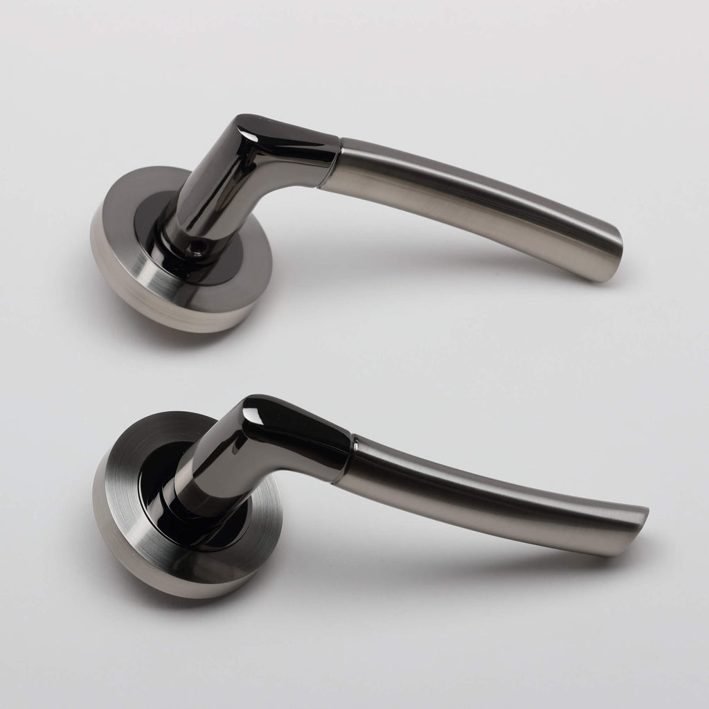 A side view of a pair of Storm Black Nickel & Nickel Brushed Handle on a white background.