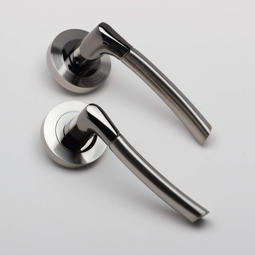 A pair of Storm Black Nickel & Nickel Brushed Handles on a white background