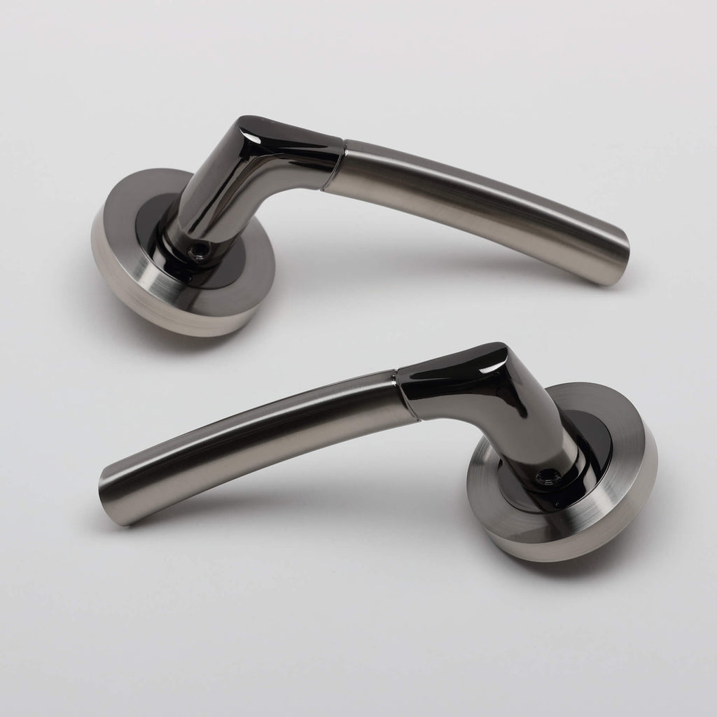 A set of Storm Black Nickel & Nickel Brushed Handles on a white background.