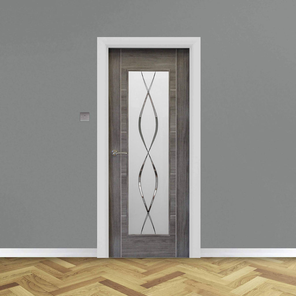 A Tigris Granite Grey 1 Lite Unglazed 40mm Internal Laminate Door, with 4mm DS5 decorative glass and Storm door handle, in a home interior setting.