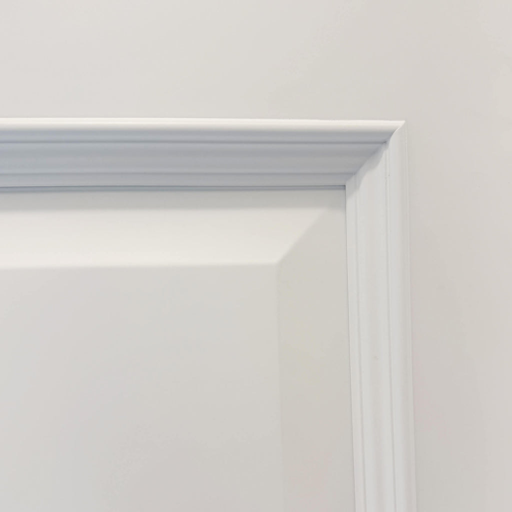Close up of the corner panelling on a Toledo White Primer Plus Door.