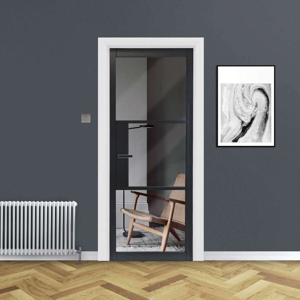A Tribeca Black Primer Plus 3 Lite Pre-Glazed 40mm Internal Door, looking into a another room, in a home interior.