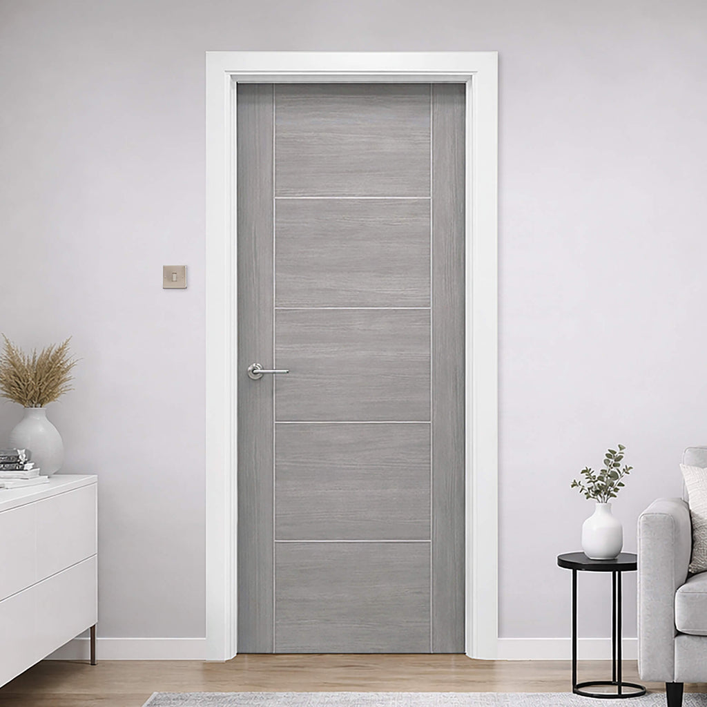 Vancouver Lava Grey Laminate Door in a living room in a modern interior home setting.