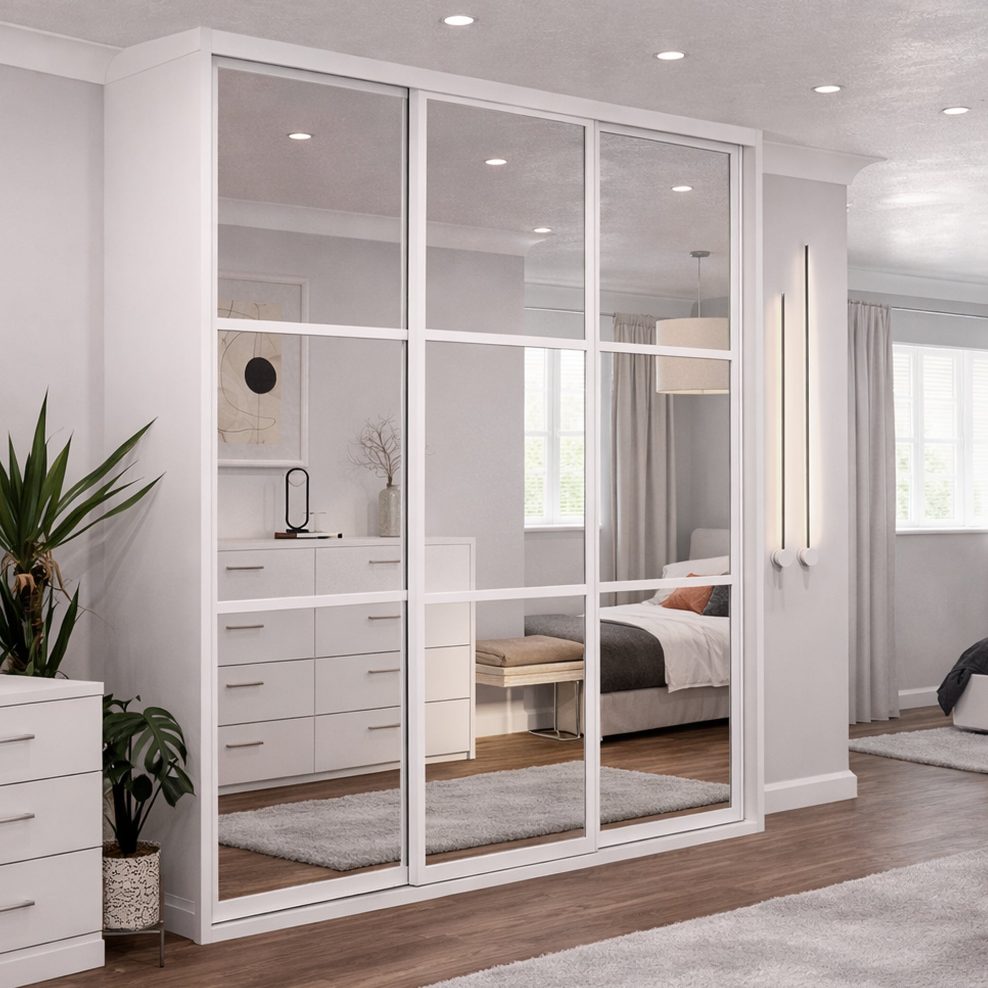 Modern bedroom with White Framed Mirrored Doors added to a wardrobe.